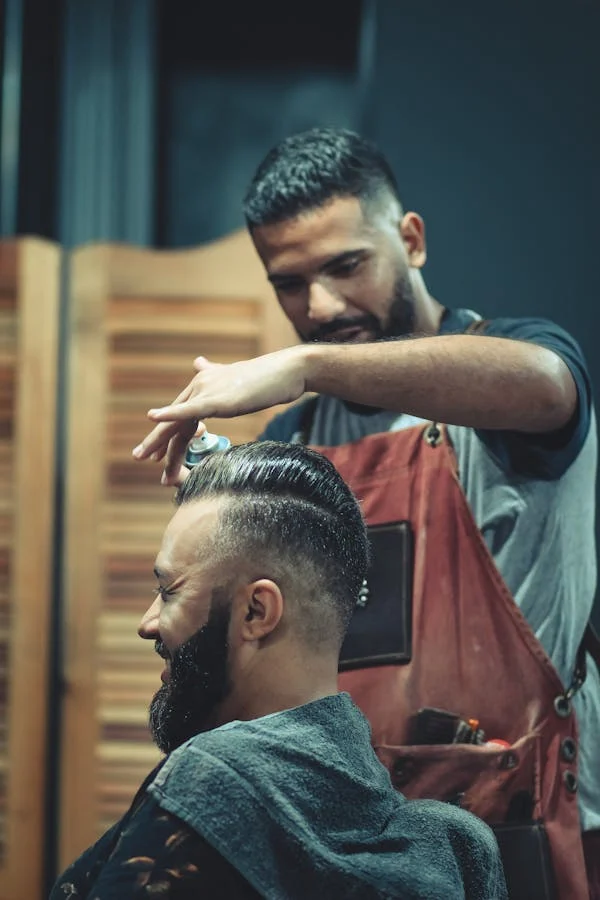 haircut on going with the customer smiling